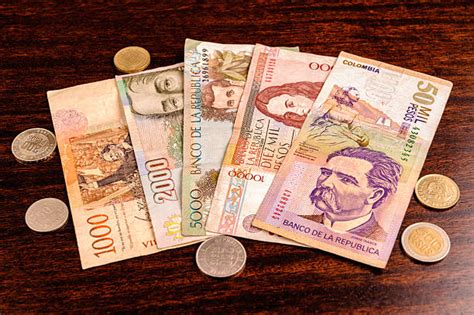 80000 colombian pesos to dollars
